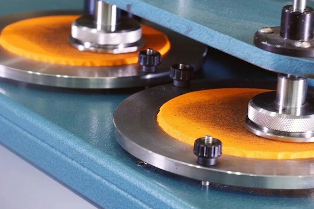 SQG professional abrasion resistance testing following EN388 standards to verify safety glove coating durability.