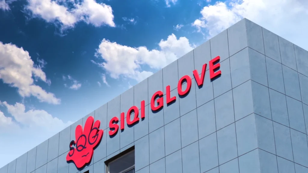 The modern factory facade of SQG SIQI GLOVE, a professional PPE glove manufacturing expert specializing in high-quality hand protection solutions.