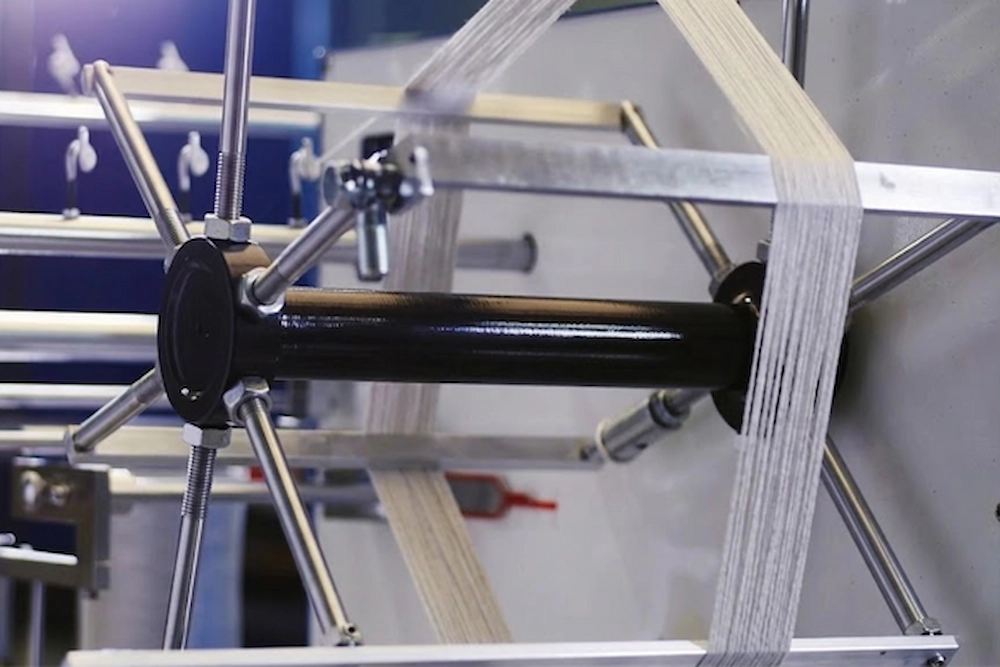 Quality control analysis of yarn twist and integrity at SQG research and development center.